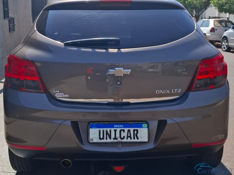 Unicar Veculos | Onix 1.4 MPFI LTZ 8V FLEX 4P MANUAL 13/14 - foto 4