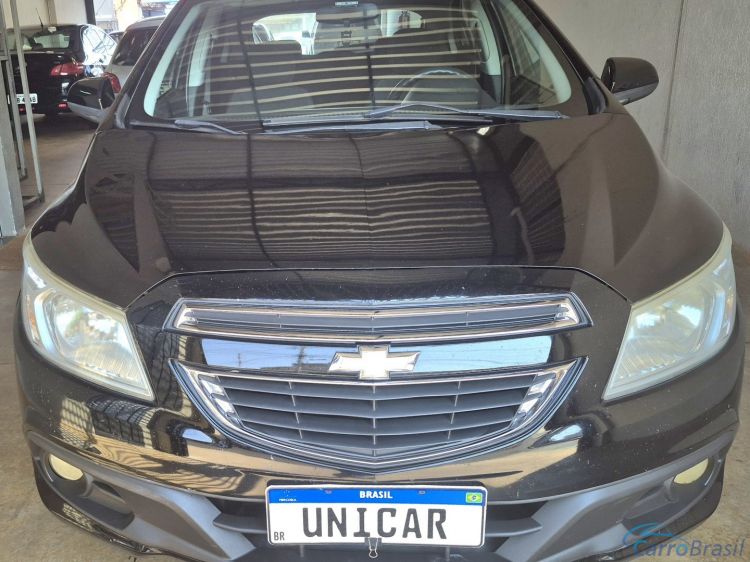 Unicar Veculos | Onix 1.0 MPFI LT 8V FLEX 4P MANUAL 13/13 - foto 1