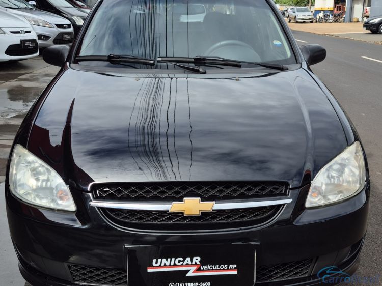 Unicar Veículos | Corsa Sedan 1.0 MPFI LS 8V FLEX 4P MANUAL 13/14 - foto 1