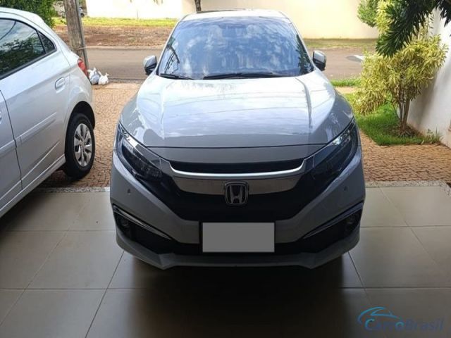 Mais detalhes do Honda Civic New Civic Toring 4P.  Flex